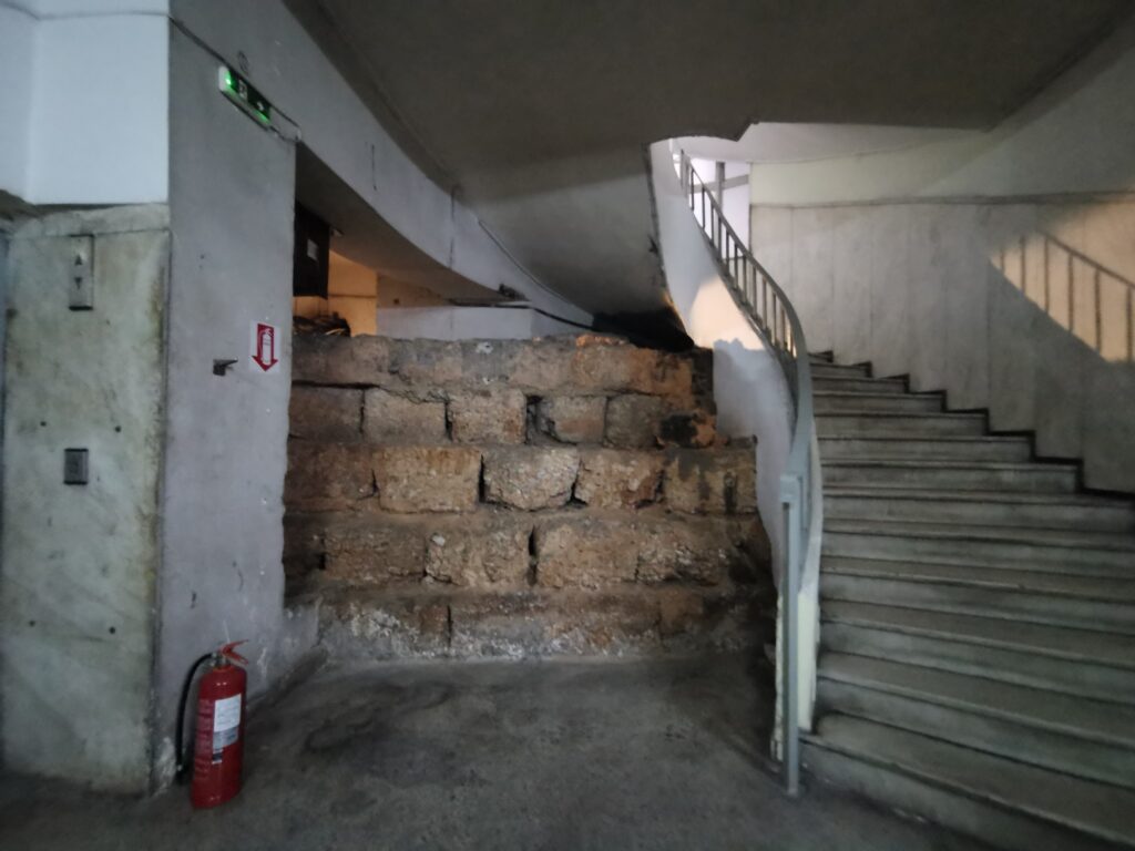 The ancient wall in the staircase
